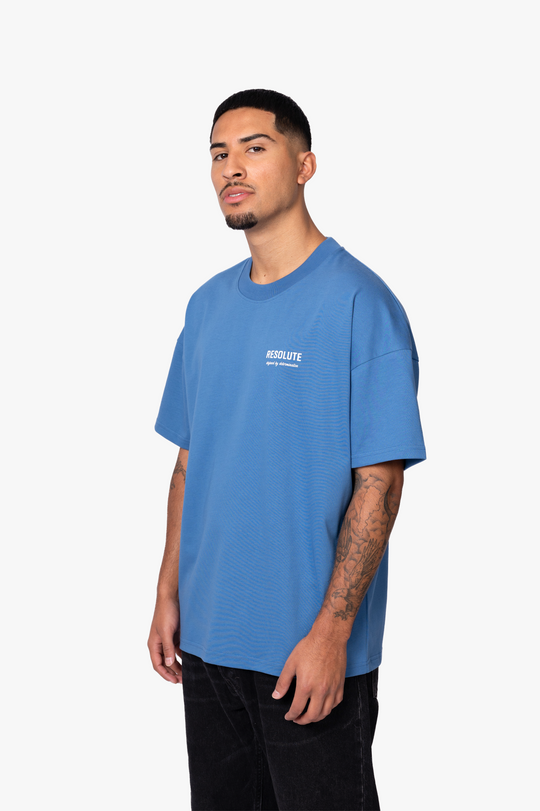 DEFINED BY DETERMINATION T-SHIRT | BLUE